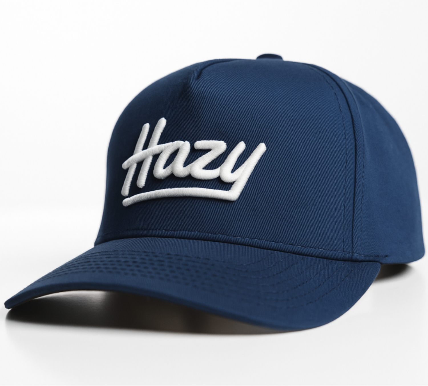 Blue cap with 'Hazy' logo on a white background