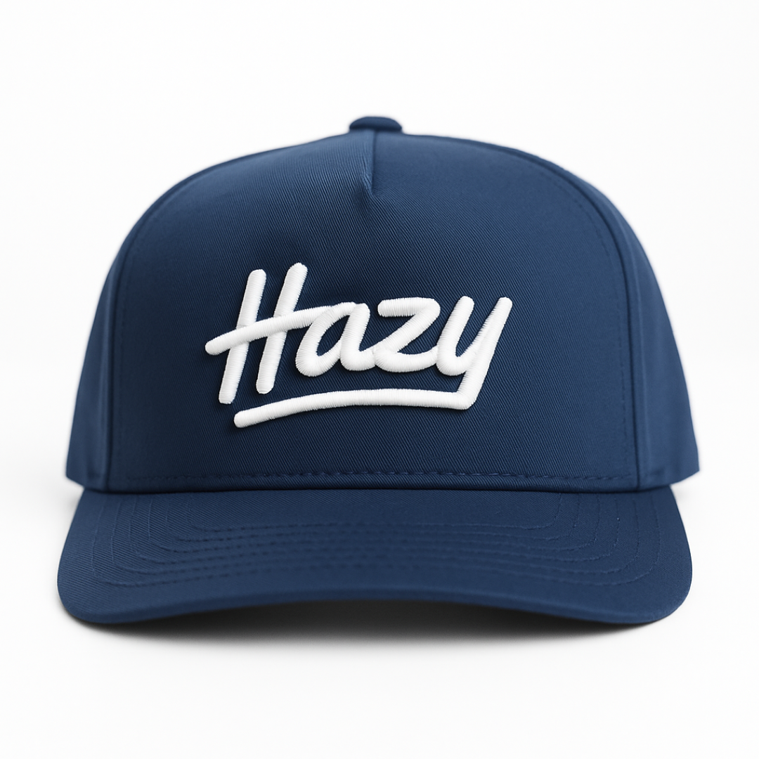 Navy blue cap with 'Hazy' logo on a white background